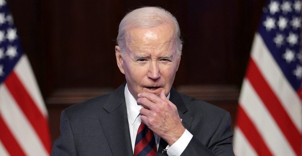 President Biden Delivers Remarks, putting his hand up to his chin