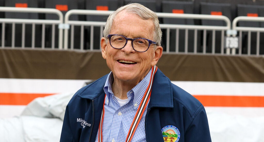 Ohio Gov. Mike DeWine in a blue shirt and coat