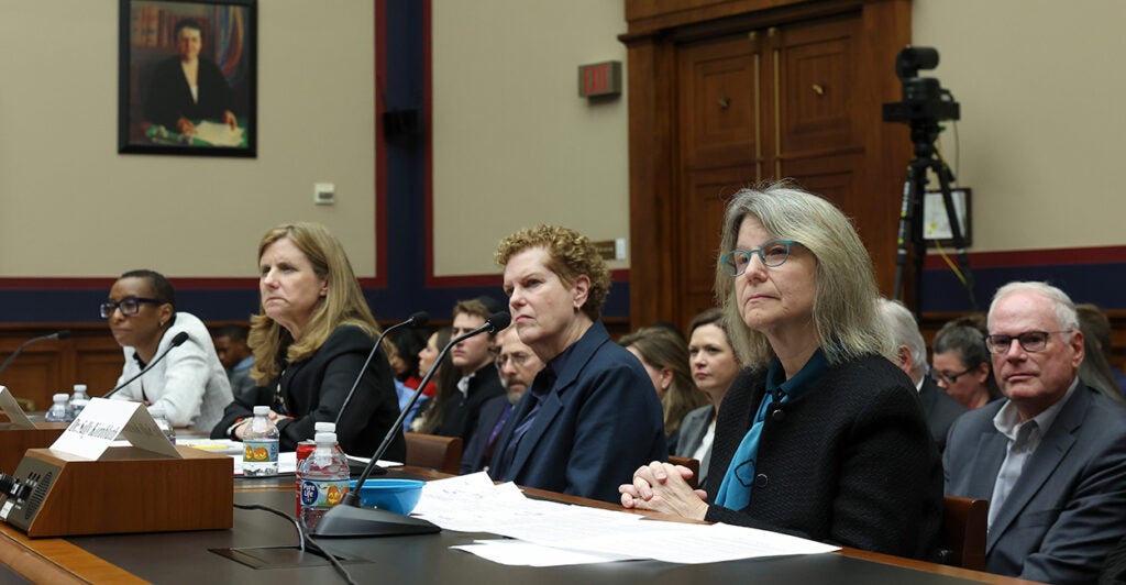 four ivy league presidents sit at a congressional hearing