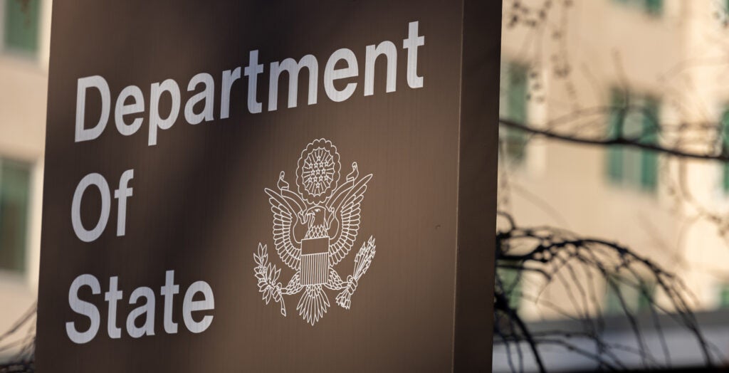 State's response to The Daily Signal comes as international religious freedom advocates press the State Department to explain why the Biden administration excluded Nigeria and India from a list of nations with severe violations of religious freedom. Pictured: The exterior of the State Department complex is seen on March 14, 2023 in Washington, DC. (Photo: Nathan Posner/Anadolu Agency via Getty Images)