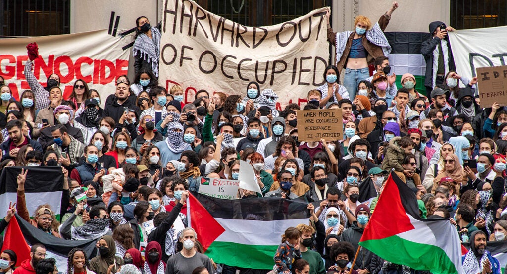 Anti-Israel protesters demonstrate with Palestinian flags and claims of genocide at Harvard University's campus