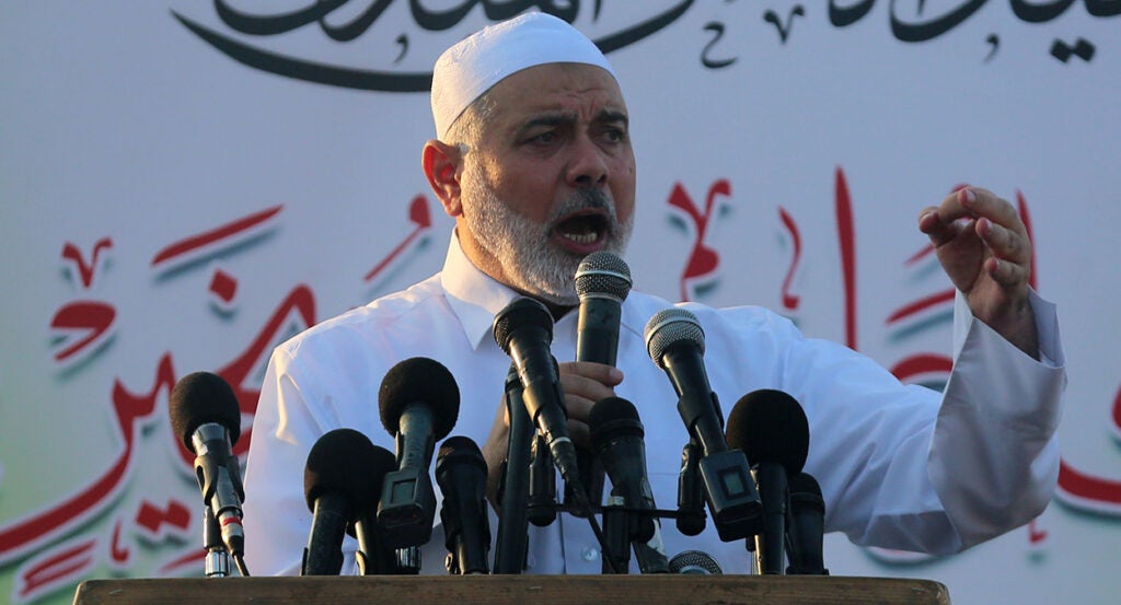 Ismail Haniyeh, a Hamas leader, speaks in white