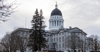 The State House in Augusta, Maine, with a grey sky