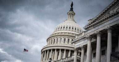 A view of the U.S. Capitol building against a cloudy sky