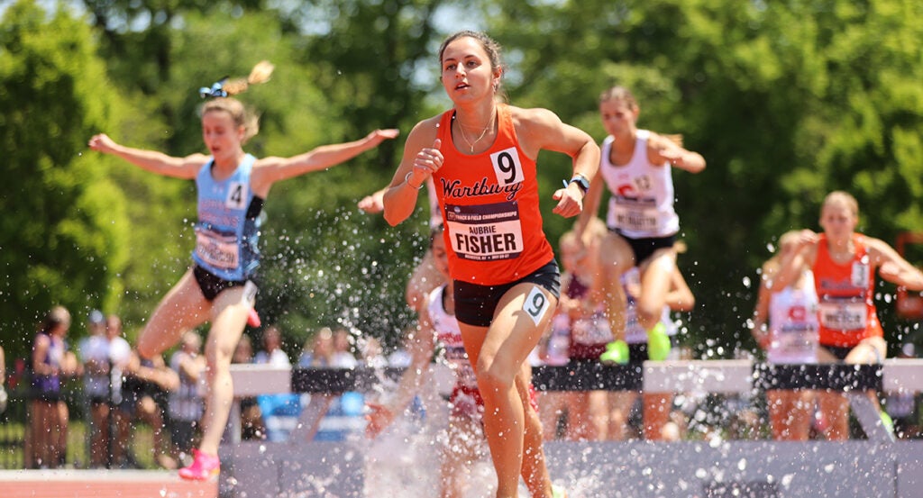 Women running track in Rochester, New York.