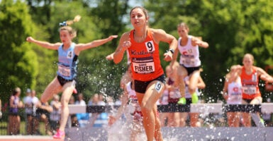 Women running track in Rochester, New York.