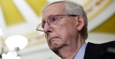 Mitch McConnell in a suit in the U.S. Capitol