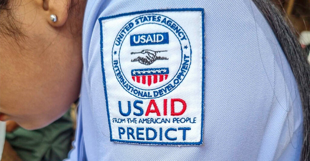 The USAID logo on the shoulder of a midwife uniform