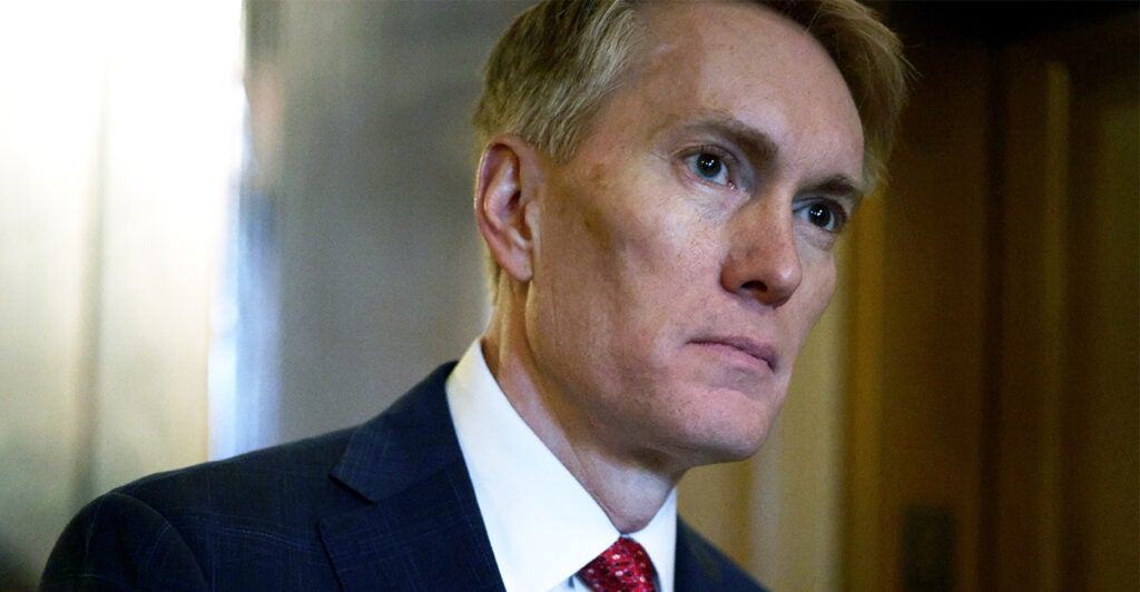 Sen. James Lankford walking in the halls of the U.S. Capitol