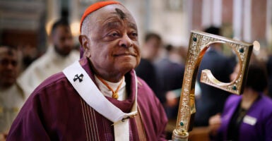 With a cross of ash on his forehead, Cardinal Wilton Gregory, archbishop of Washington, leads the recession of the Mass on Ash Wednesday at the Cathedral of St. Matthew the Apostle on February 22, 2023 in Washington, DC. (Photo by Chip Somodevilla/Getty Images)