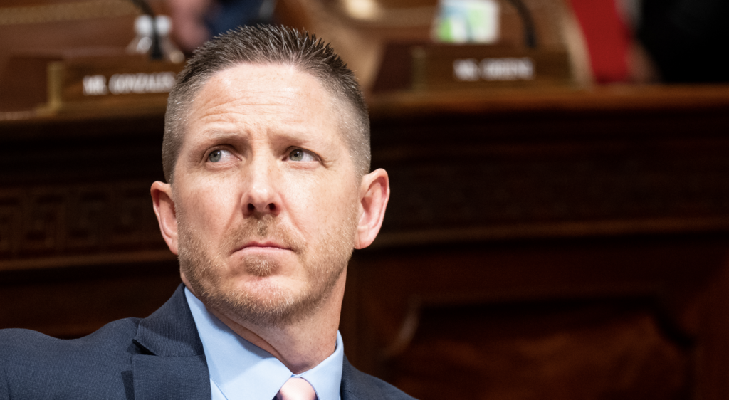 Rep. Josh Brecheen listens during a House committee hearing