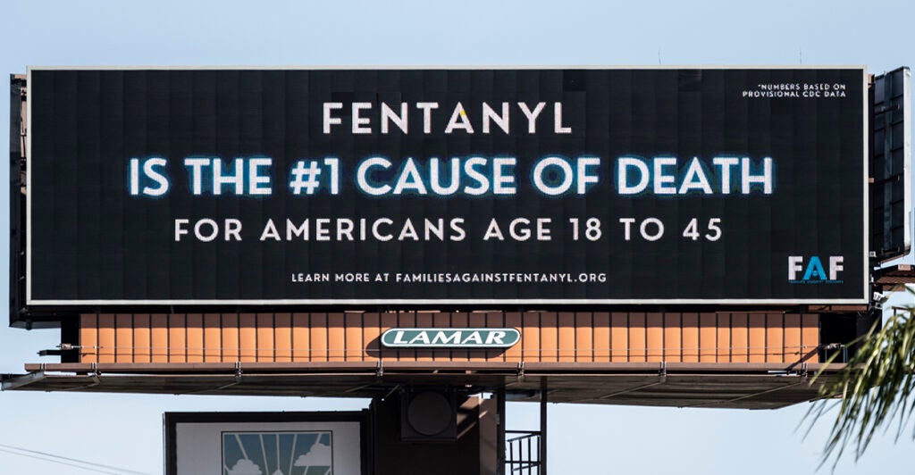 A billboard says fentanyl is the number one cause of death for Americans ages 18 to 45