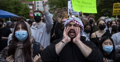 George Washington University students camp out on campus to demand that their university divest from Israel and call for a ceasefire in Gaza, on April 25, 2024 in Washington, D.C.,