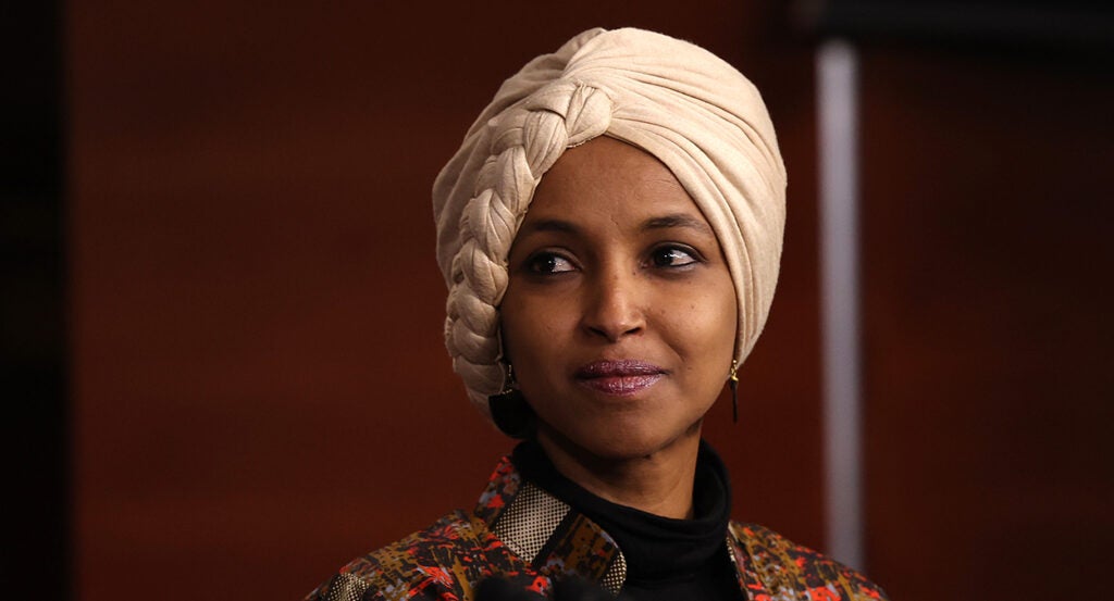 Rep. Ilhan Omar wears a head covering