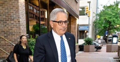 Philadelphia District Attorney Larry Krasner walking.