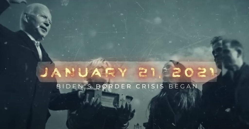 A Screenshot from the documentary “Alien Invasion,” showing a black-and-white picture of Joe Biden being sworn in as president with the graphic "January 21, 2021 —Biden's Border Crisis Began" Superimposed