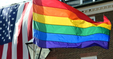 The City of Alexandra, Virginia, is drawing fire for painting pride flags that include transgender symbols over the crosswalks of historic Old Town, Alexandria. (Photo by Shannon Finney/Getty Images)