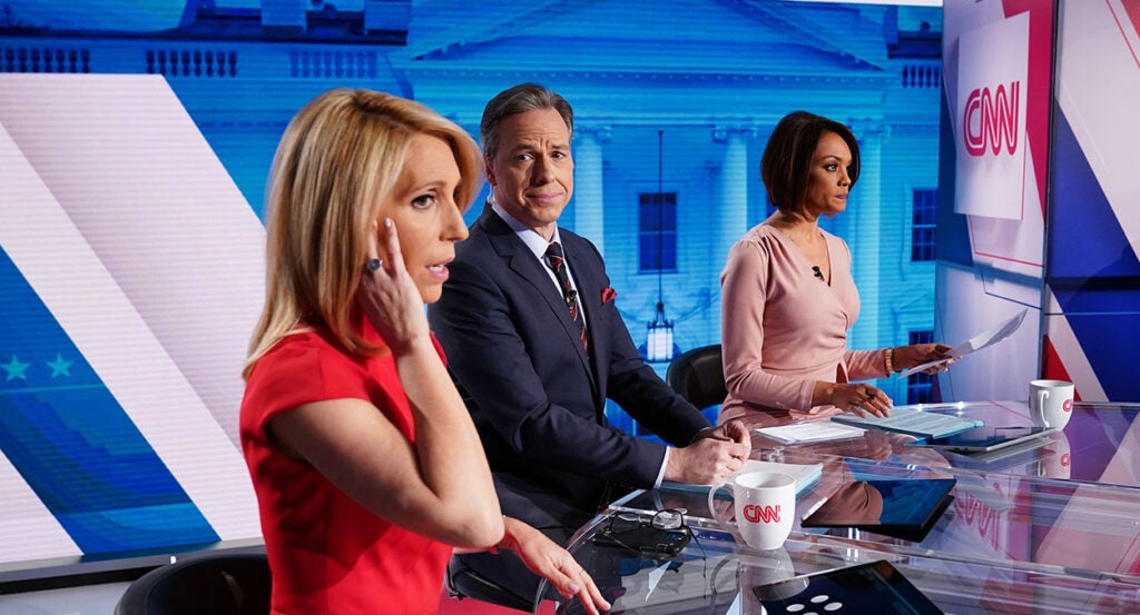 Jake Tapper, Dana Bash, and Ilia Calderon at a CNN desk