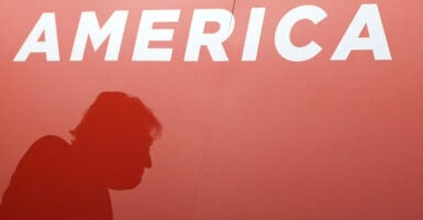 Silhouette detail of Donald Trump as he attends the first day of the Republican National Convention.