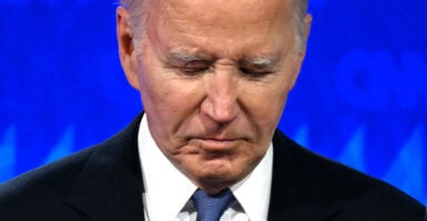 President Joe Biden looks down in the CNN debate