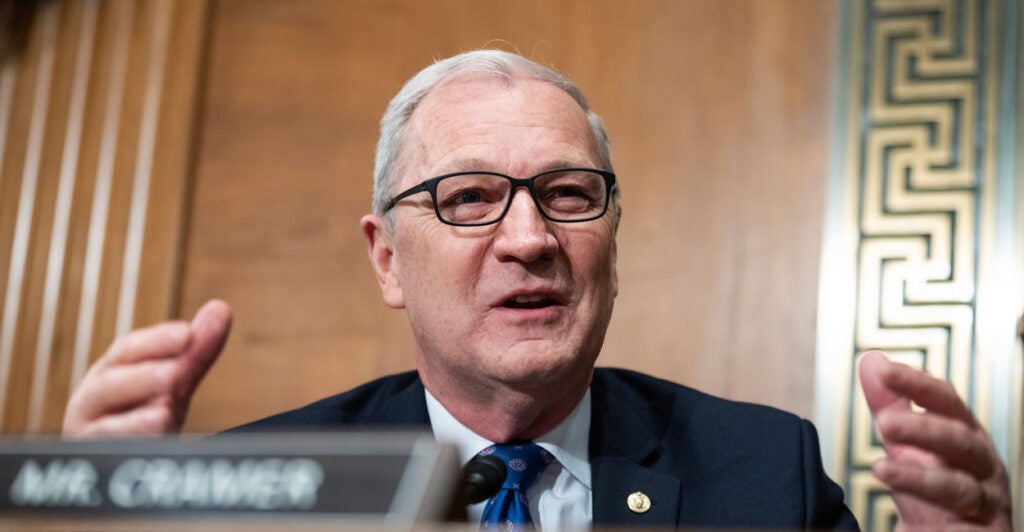 Senator Kevin Cramer speaking behind a desk.