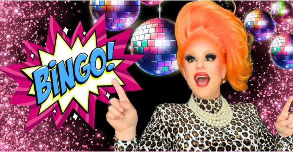 A drag queen points to the word, "Bingo!"