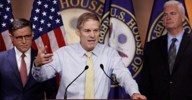 Jim Jordan speaks passionately into a microphone.