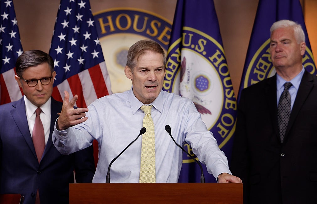 Jim Jordan speaks passionately into a microphone.