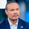 Dan Bongino in a blue pin-stripe sport coat