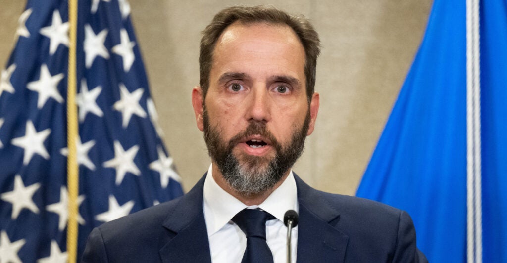 Special counsel Jack Smith speaks to members of the media at the U.S. Department of Justice building.