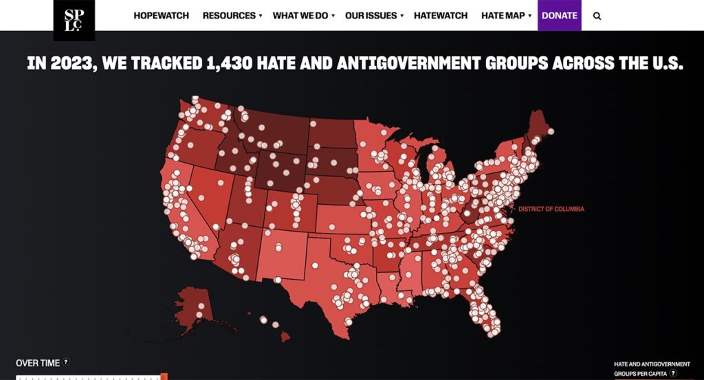 A red and black map of the U.S. with "hate map" dots