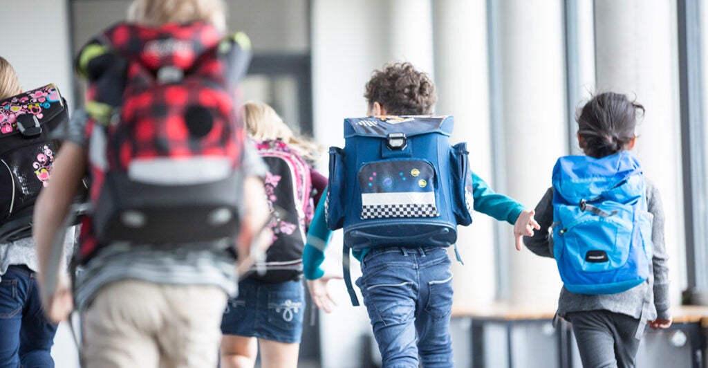 Kids run in the hallway.