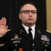 Alexander Vindman in his military uniform holds up his right hand to testify