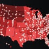 A red map of the United States with red dots across it