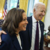 Kamala Harris and Joe Biden smile in the Oval Office