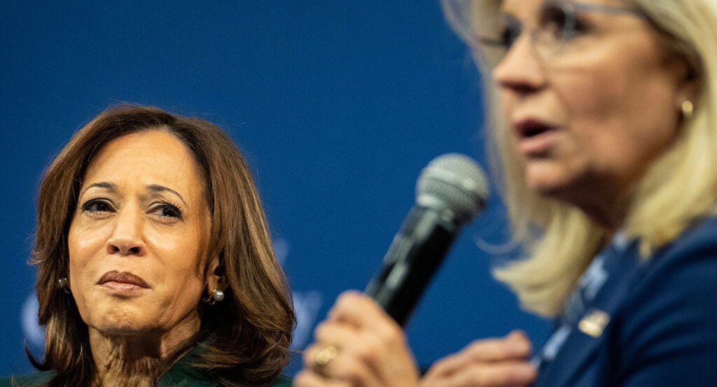 Kamala Harris listens to Liz Cheney