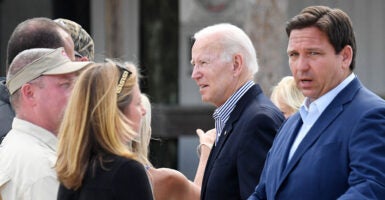 Joe Biden and Ron DeSantis talk to citizens outdoors