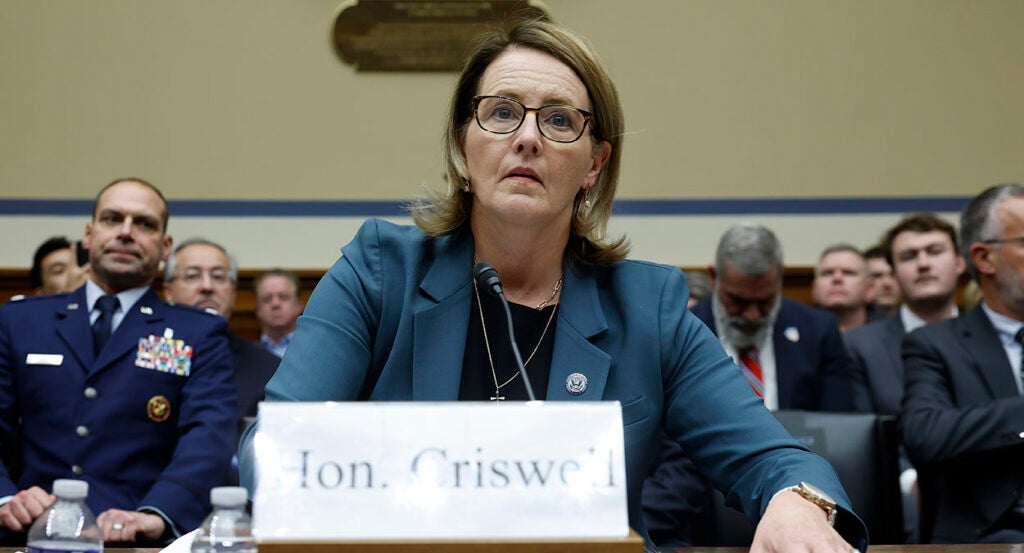 FEMA Administrator Deanne Criswell testifies in a purple suit