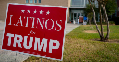 A Trump campaign sign targeting Hispanics greets voters on Election Day at a polling place in Houston. (Yi-Chin Lee/Houston Chronicle via Getty Images)