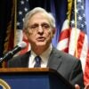 U.S. Attorney General Merrick Garland stands at a podium speaking