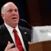 Thomas Homan, President Donald Trump's selection to be the border czar, testifies at a Congressional hearing wearing a red tie.