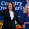 Kamala Harris and Liz Cheney smiling and greeting supporters at an event