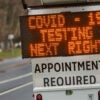 A digital sign on Long Island, N.Y., directs patients to a drive-through coronavirus test site on March 28, 2020.