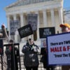 Rep. Marjorie Taylor Greene, R-Ga., speaks Wednesday outside the Supreme Court.