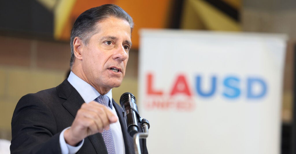 Los Angeles schools chief Alberto Carvalho before a microphone