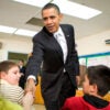 Then-President Barack Obama visits with sixth-graders at an elementary school in Falls Church, Virginia, on Jan. 19, 2010.