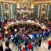 An aerial view of the Wisconsin state Capitol Rotunda filled with demonstrators in February 2011