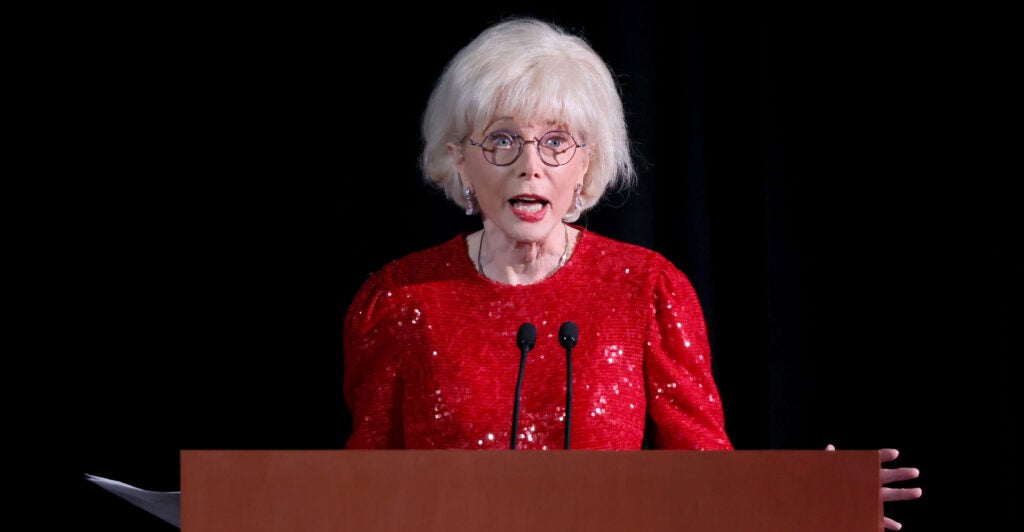 CBS' Lesley Stahl in a spangly red outfit