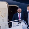 From left, Jason Miller, Elon Musk, and Stephen Miller disembark with President-elect Donald Trump at Joint Base Andrews, Maryland.