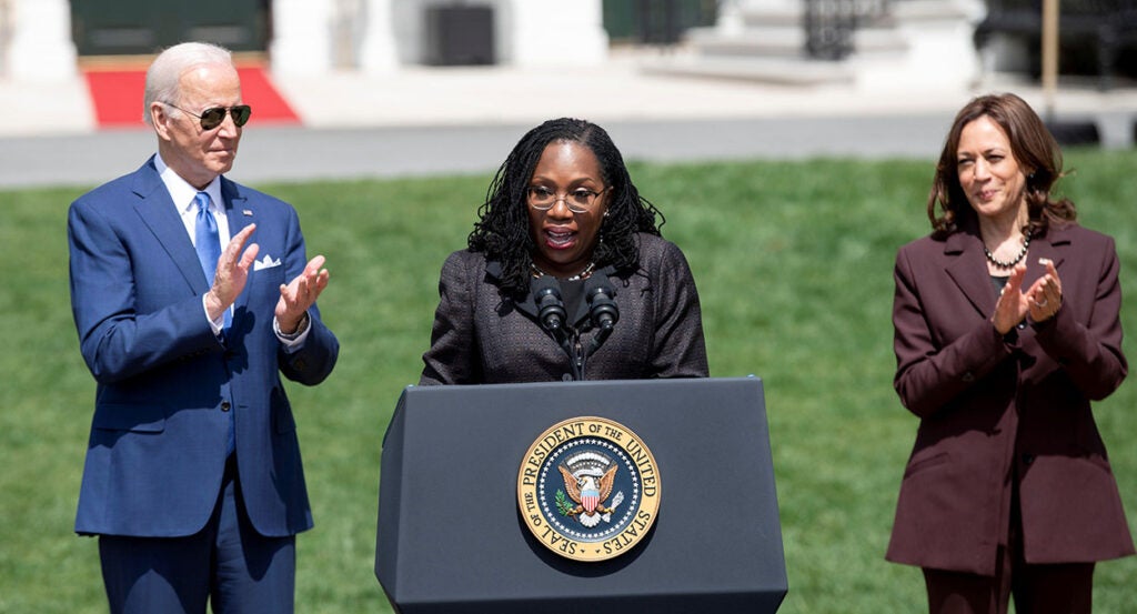 Ketanji Brown Jackson speaks between President Joe Biden and Vice President Kamala Harris